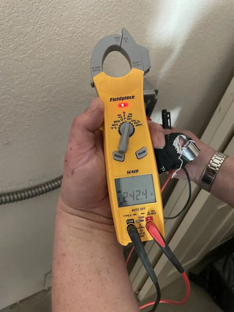 Voltage testing with clamp meter during Electrical Installation Services in Caddo Mills